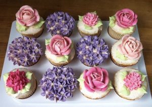 Cupcakes with buttercream roses and hydrangeas